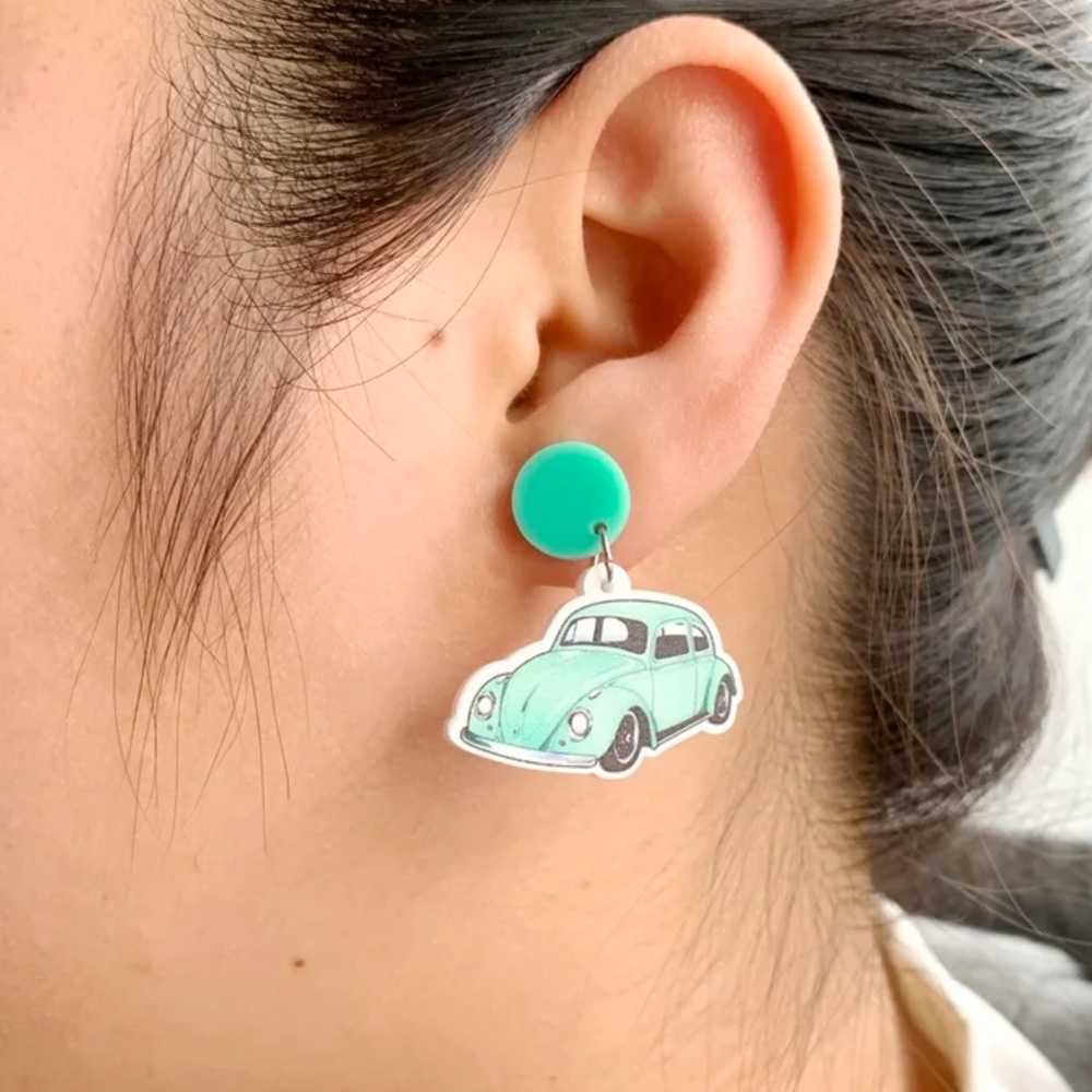 Adorable pastel pink acrylic Volkswagen pierced earrings. KAWAII